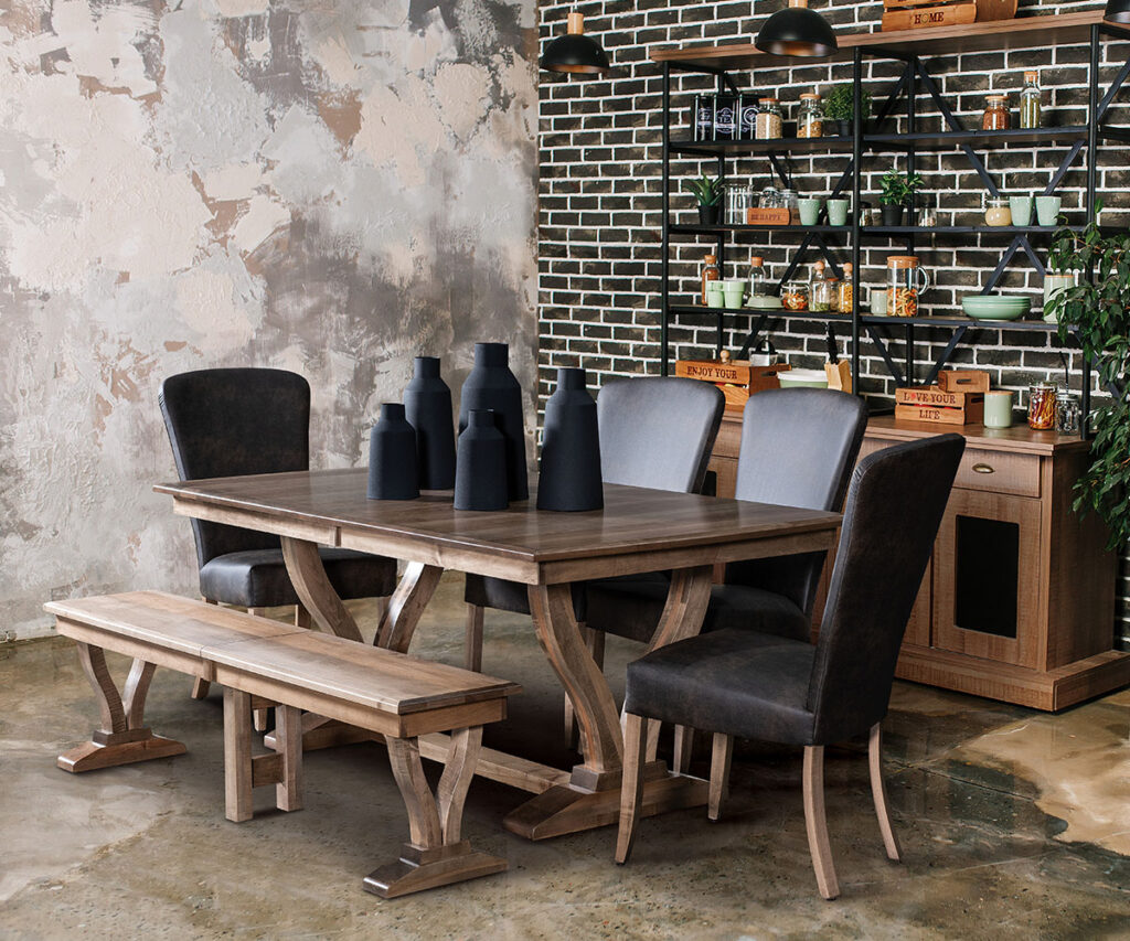 Amish dining room furniture Tennessee—trestle table, bench, and upholstered chairs.