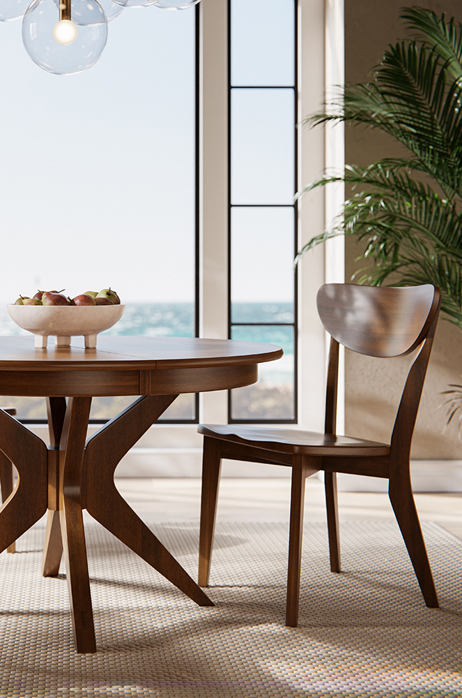 A handcrafted dining furniture set featuring a mid-century modern wooden table and chair, illuminated by natural light from floor-to-ceiling windows with an ocean view in the background.