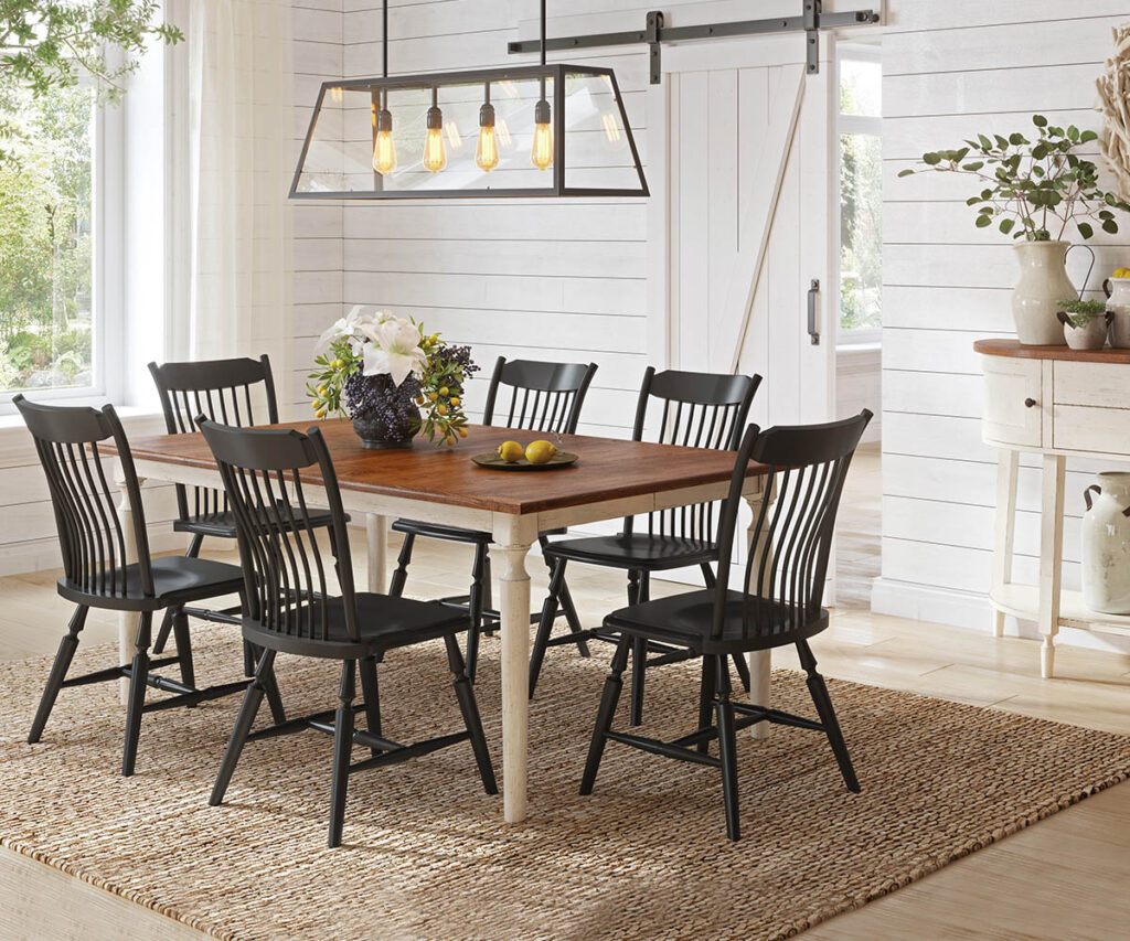 Amish dining room furniture Tennessee—two-tone farmhouse table with black spindle chairs.