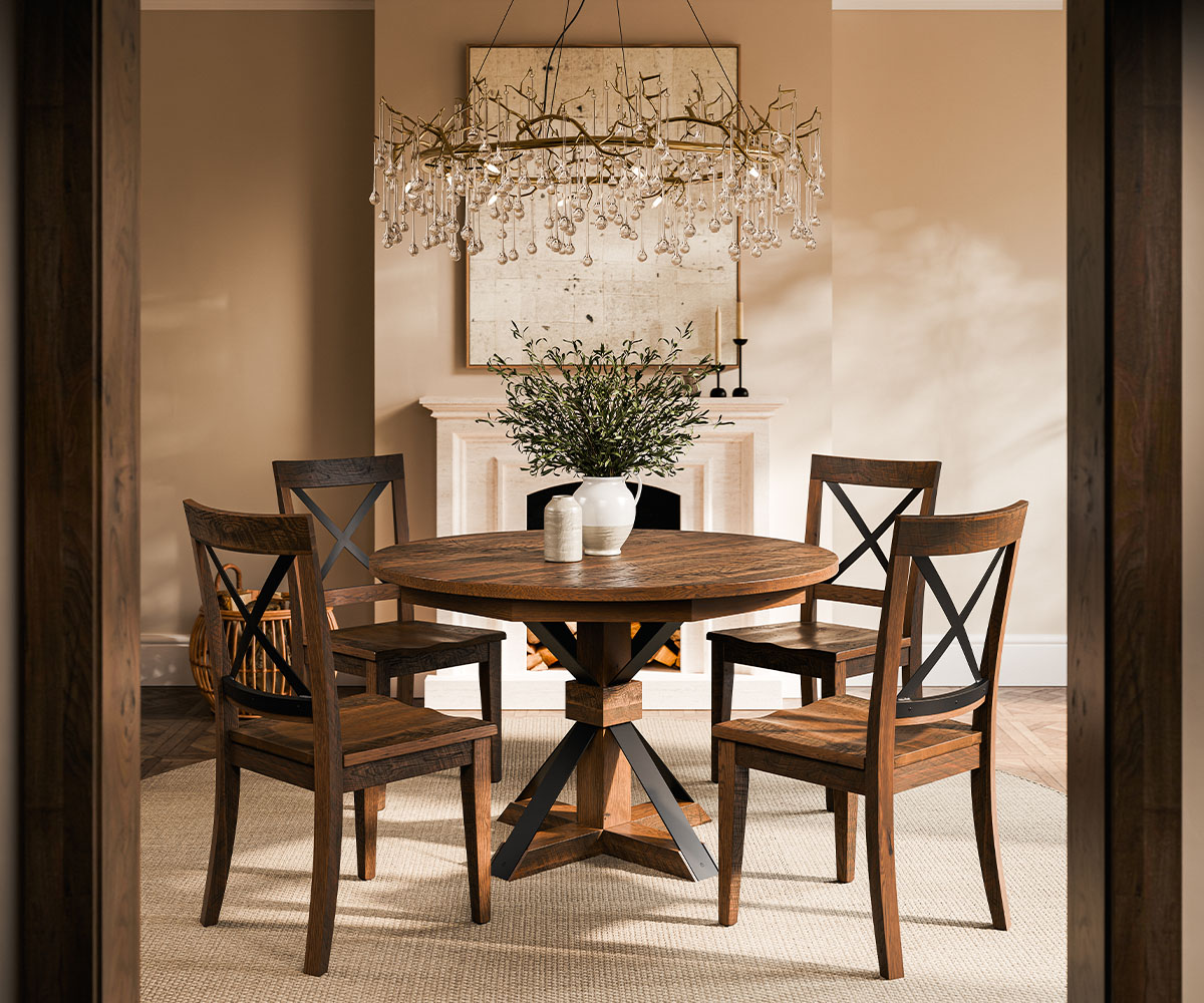 Amish Furniture in Greeneville round pedestal dining table with four X-back chairs.